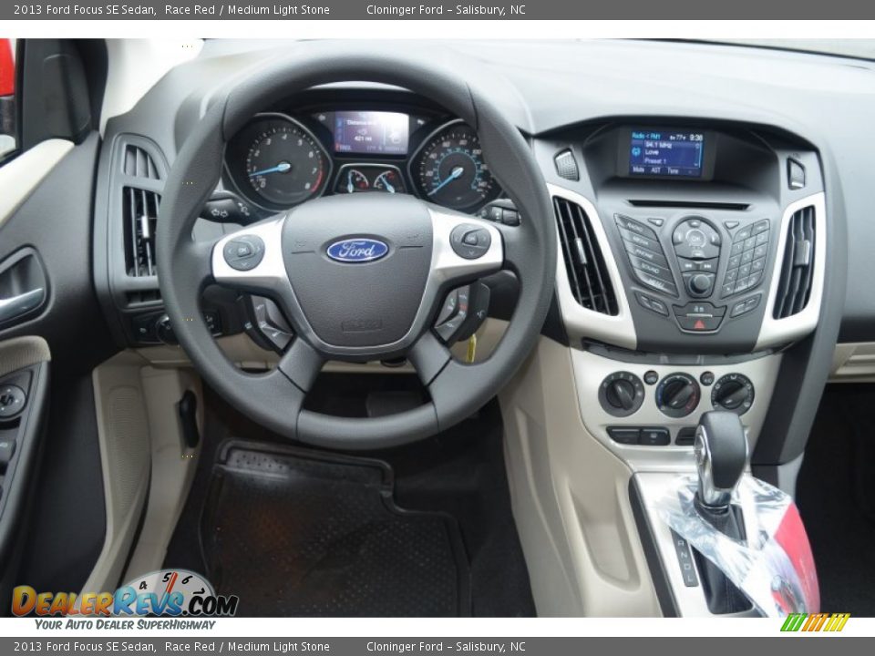 2013 Ford Focus SE Sedan Race Red / Medium Light Stone Photo #10