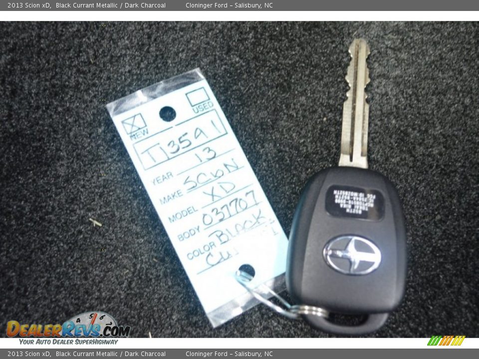 2013 Scion xD Black Currant Metallic / Dark Charcoal Photo #17