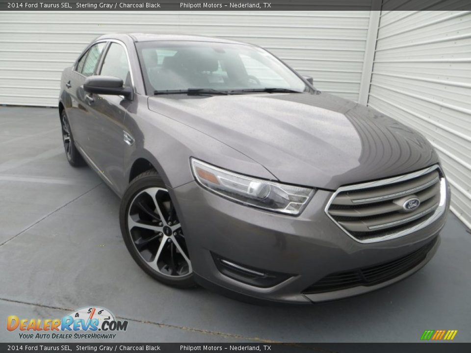 Front 3/4 View of 2014 Ford Taurus SEL Photo #1
