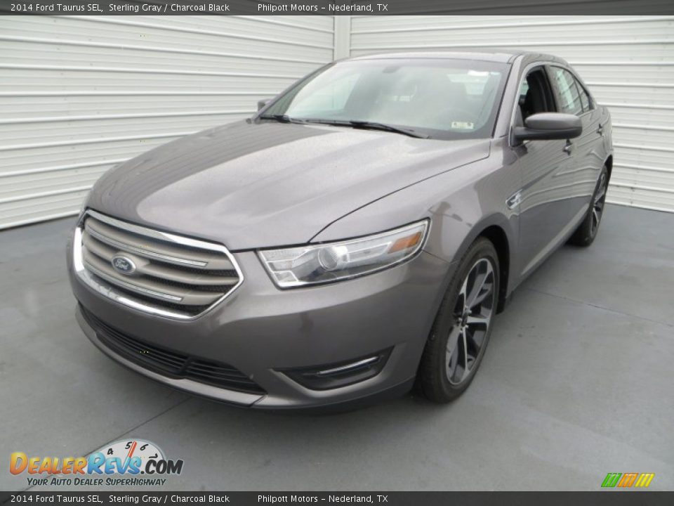 Front 3/4 View of 2014 Ford Taurus SEL Photo #11