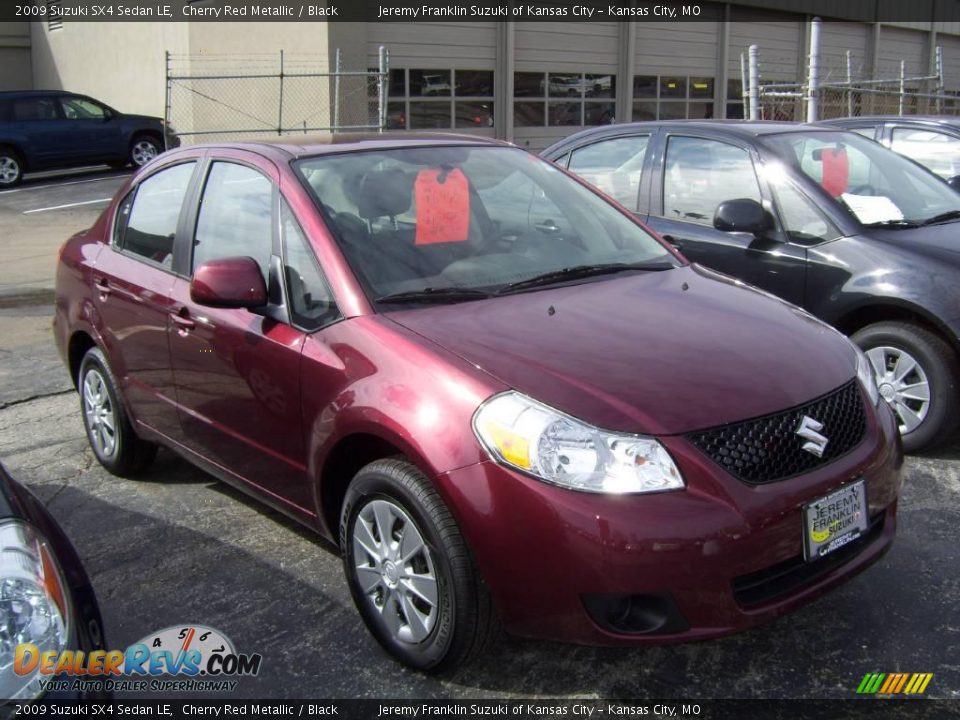 2009 Suzuki SX4 Sedan LE Cherry Red Metallic / Black Photo #1