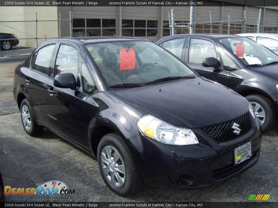 2009 Suzuki SX4 Sedan LE Black Pearl Metallic / Beige Photo #1