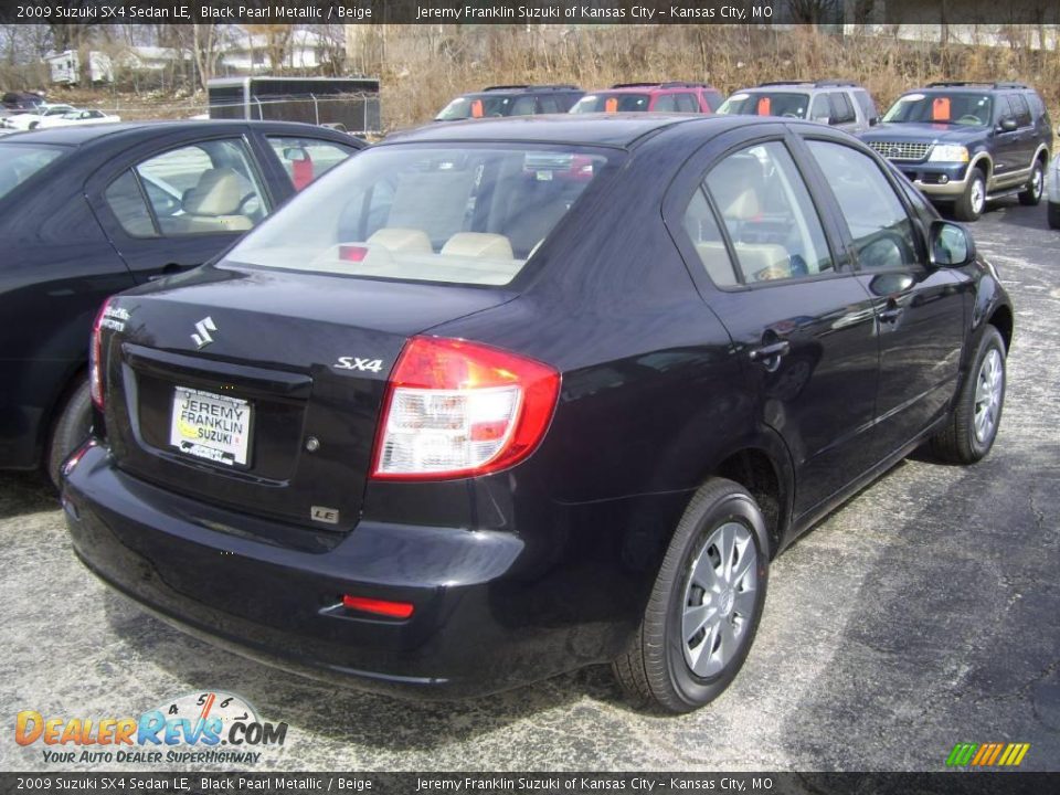 2009 Suzuki SX4 Sedan LE Black Pearl Metallic / Beige Photo #2