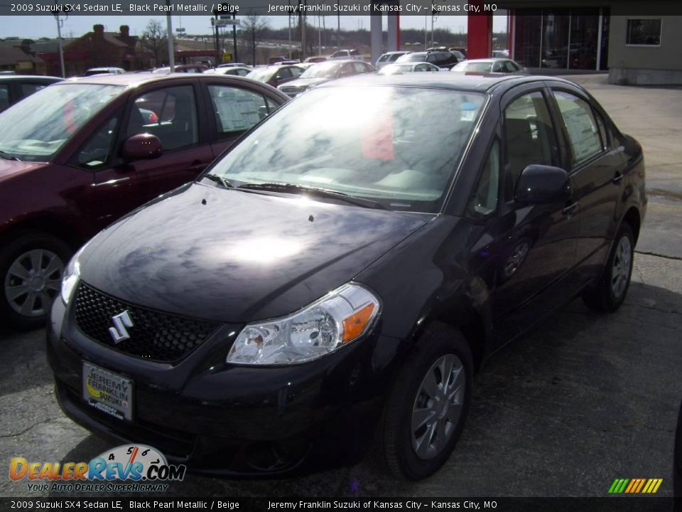 2009 Suzuki SX4 Sedan LE Black Pearl Metallic / Beige Photo #5