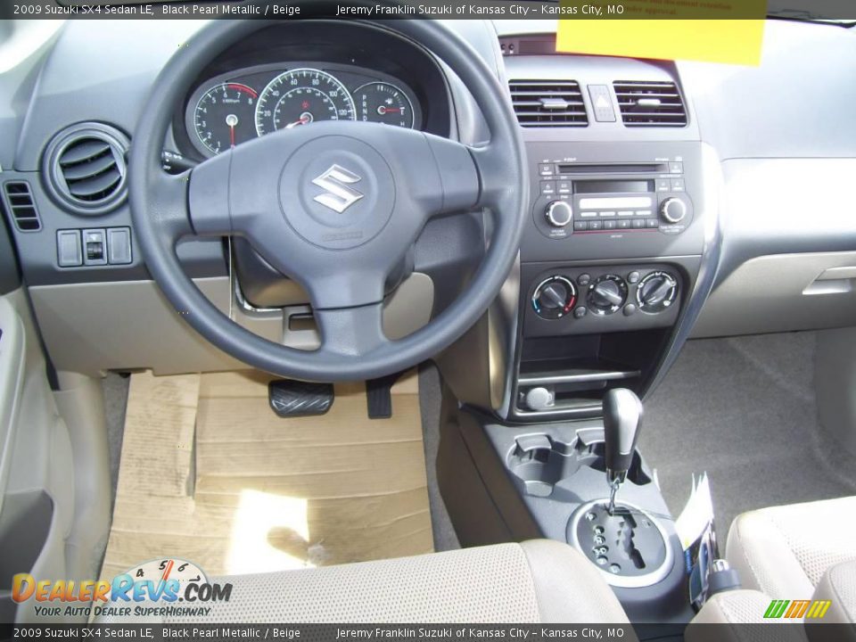 2009 Suzuki SX4 Sedan LE Black Pearl Metallic / Beige Photo #9