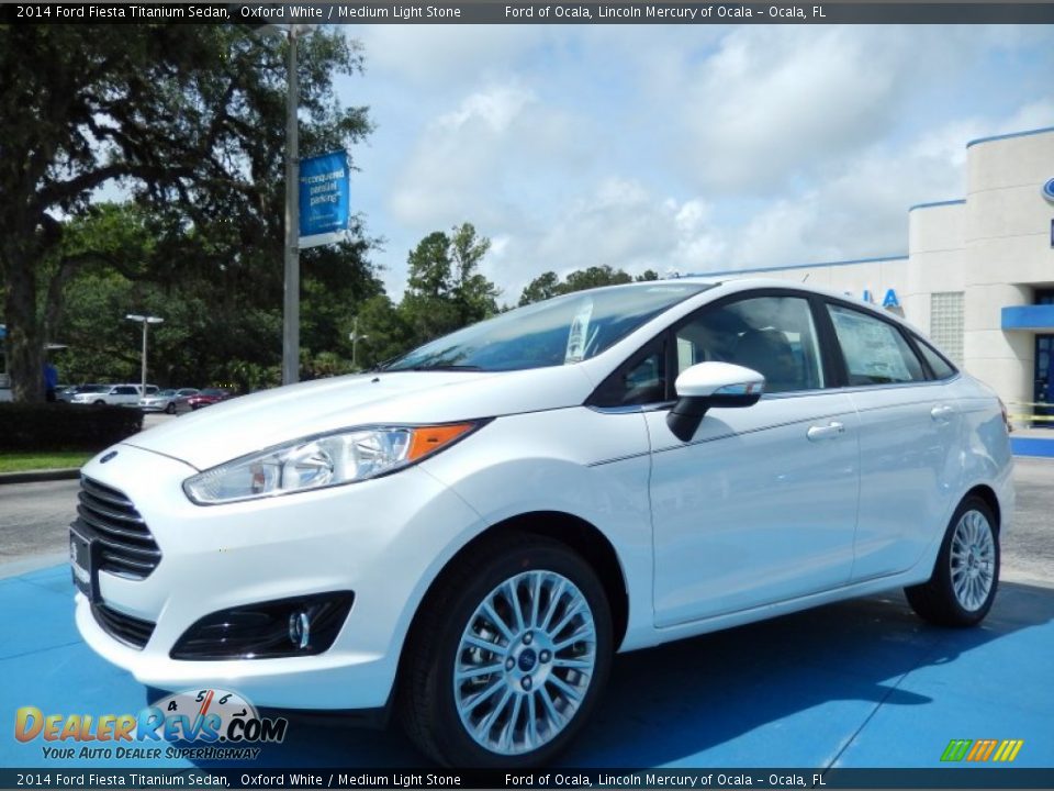 Front 3/4 View of 2014 Ford Fiesta Titanium Sedan Photo #1