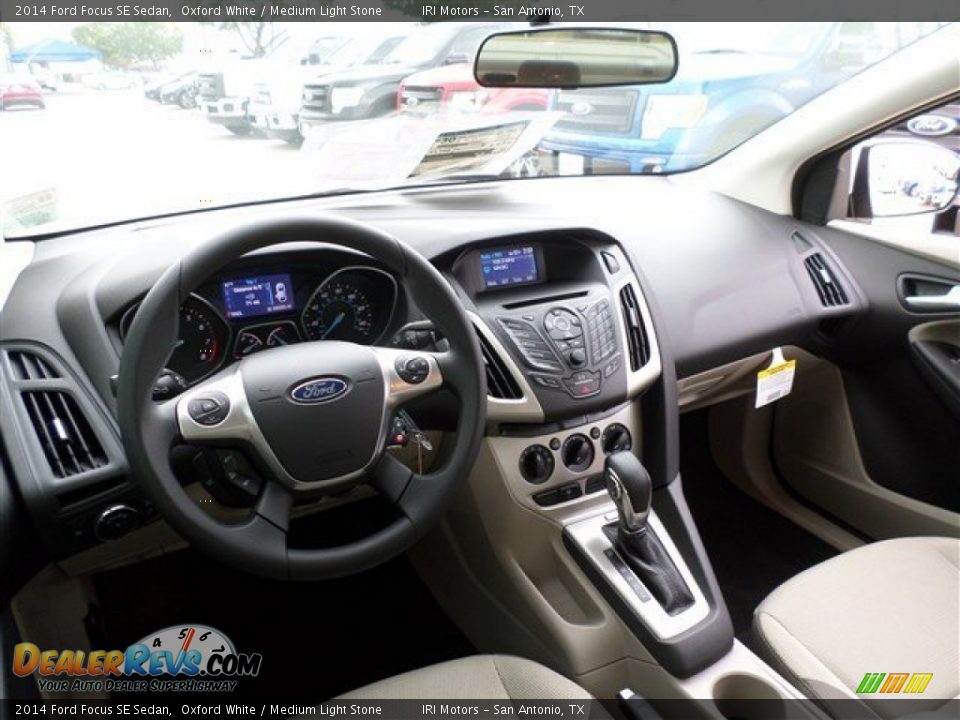 2014 Ford Focus SE Sedan Oxford White / Medium Light Stone Photo #13