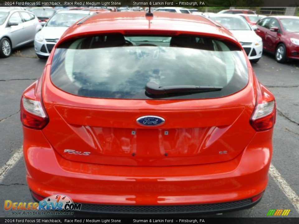 2014 Ford Focus SE Hatchback Race Red / Medium Light Stone Photo #3