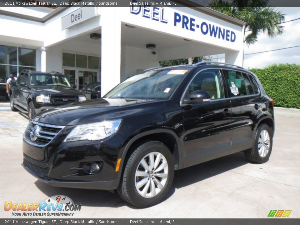 2011 Volkswagen Tiguan SE Deep Black Metallic / Sandstone Photo #1
