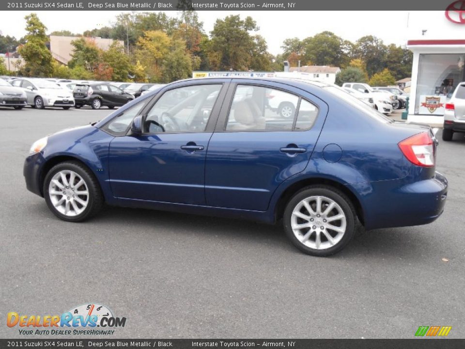 2011 Suzuki SX4 Sedan LE Deep Sea Blue Metallic / Black Photo #7