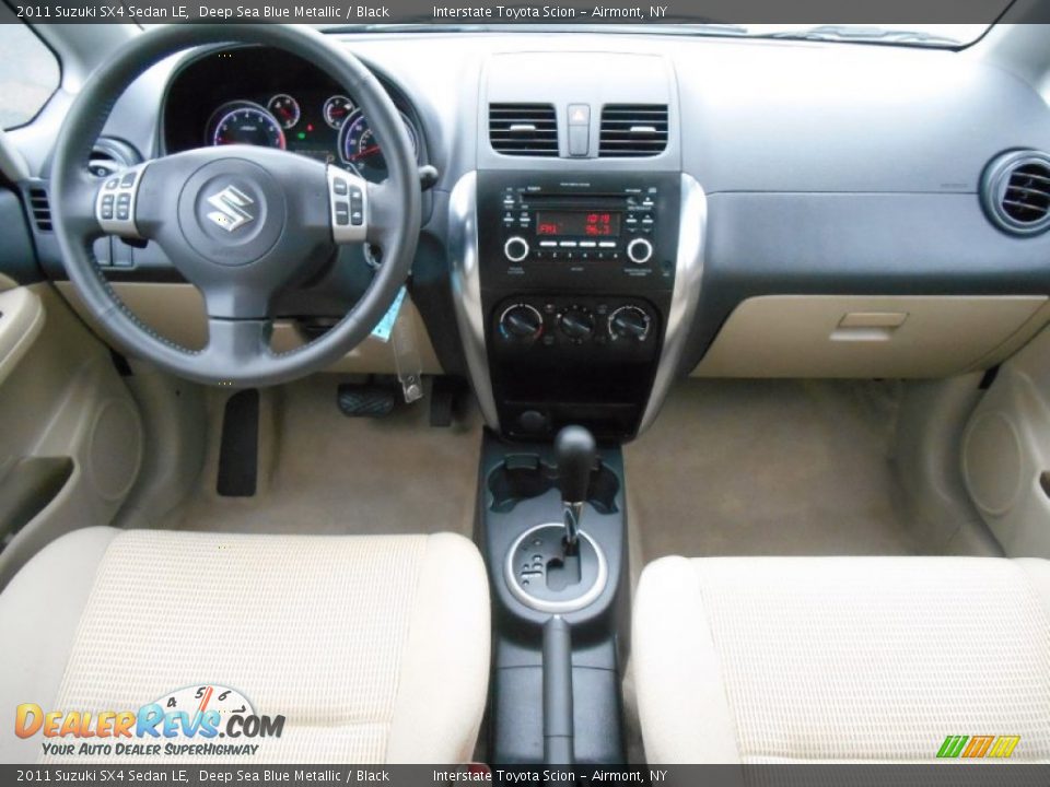 2011 Suzuki SX4 Sedan LE Deep Sea Blue Metallic / Black Photo #12