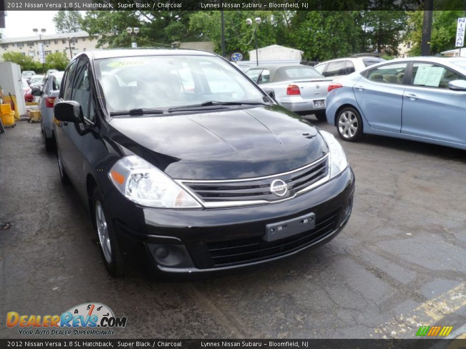 2012 Nissan Versa 1.8 SL Hatchback Super Black / Charcoal Photo #1