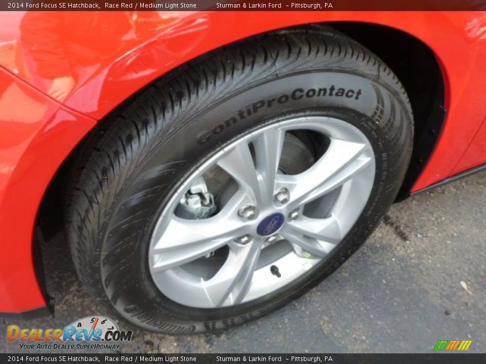 2014 Ford Focus SE Hatchback Race Red / Medium Light Stone Photo #5