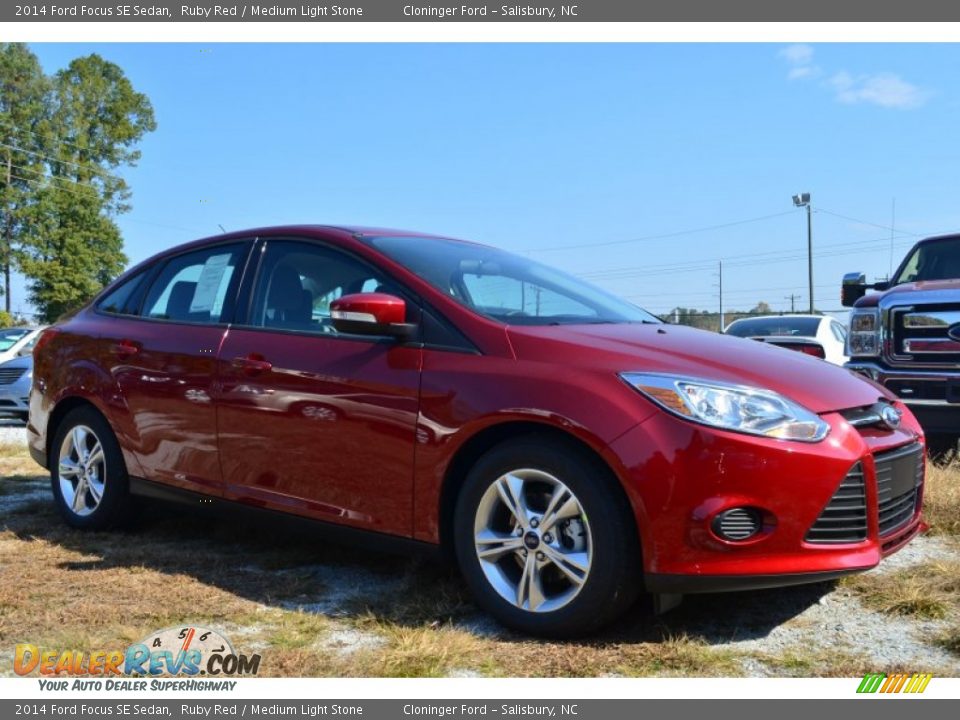 2014 Ford Focus SE Sedan Ruby Red / Medium Light Stone Photo #1