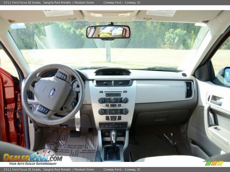 2011 Ford Focus SE Sedan Sangria Red Metallic / Medium Stone Photo #13