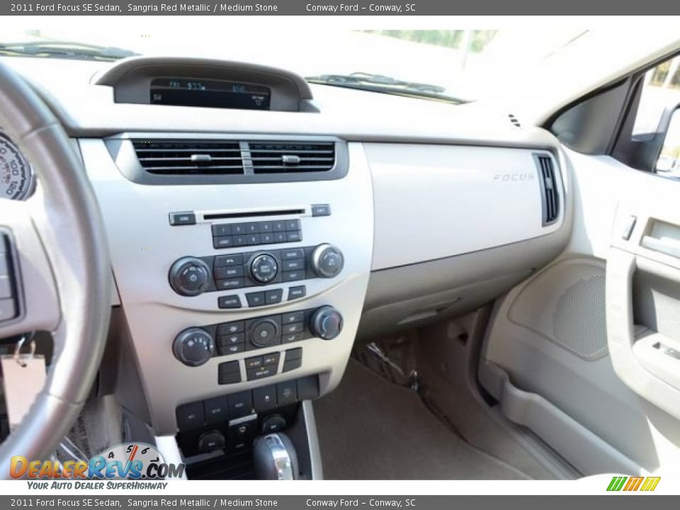 2011 Ford Focus SE Sedan Sangria Red Metallic / Medium Stone Photo #28