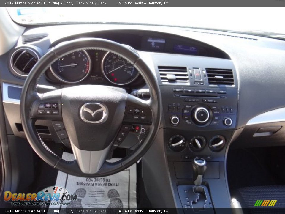 2012 Mazda MAZDA3 i Touring 4 Door Black Mica / Black Photo #10