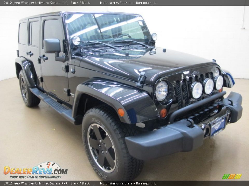 2012 Jeep Wrangler Unlimited Sahara 4x4 Black / Black Photo #1