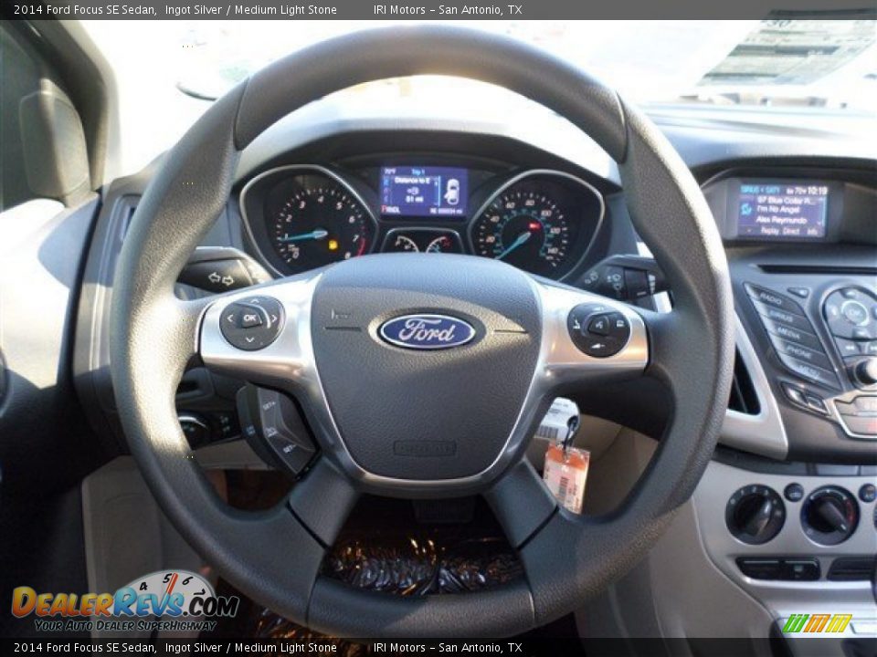 2014 Ford Focus SE Sedan Ingot Silver / Medium Light Stone Photo #17