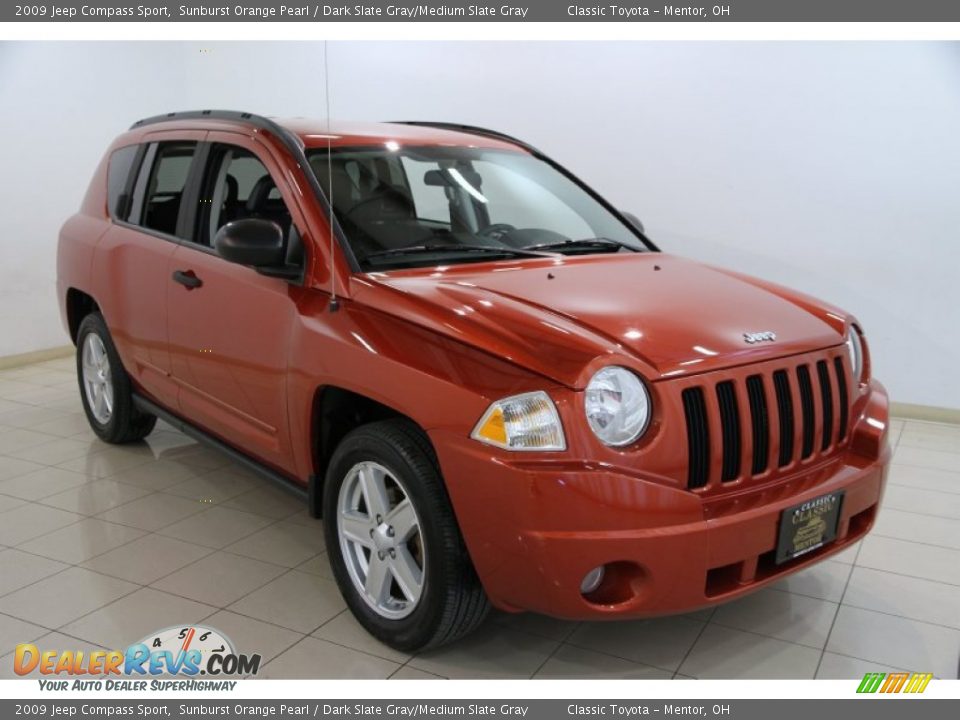 2009 Jeep Compass Sport Sunburst Orange Pearl / Dark Slate Gray/Medium Slate Gray Photo #1