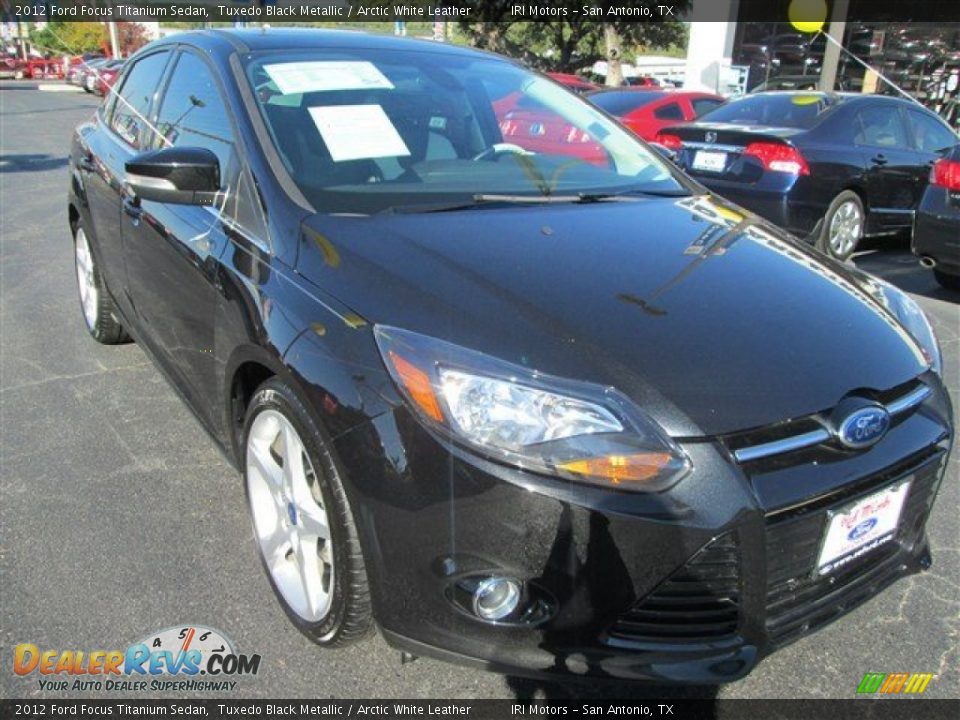 2012 Ford Focus Titanium Sedan Tuxedo Black Metallic / Arctic White Leather Photo #1