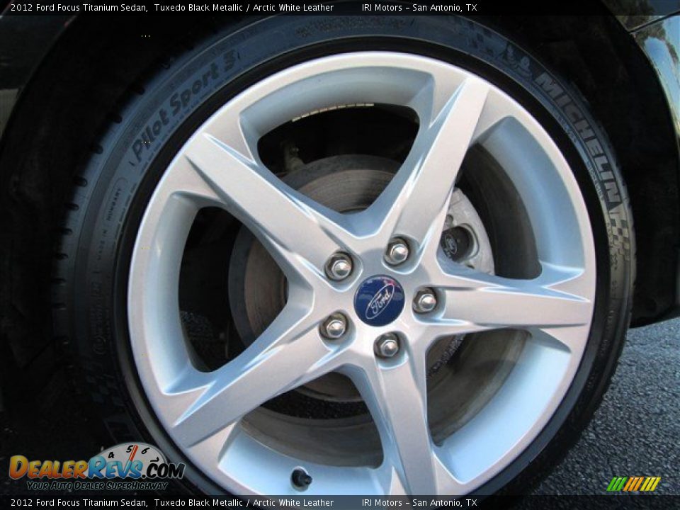 2012 Ford Focus Titanium Sedan Tuxedo Black Metallic / Arctic White Leather Photo #4