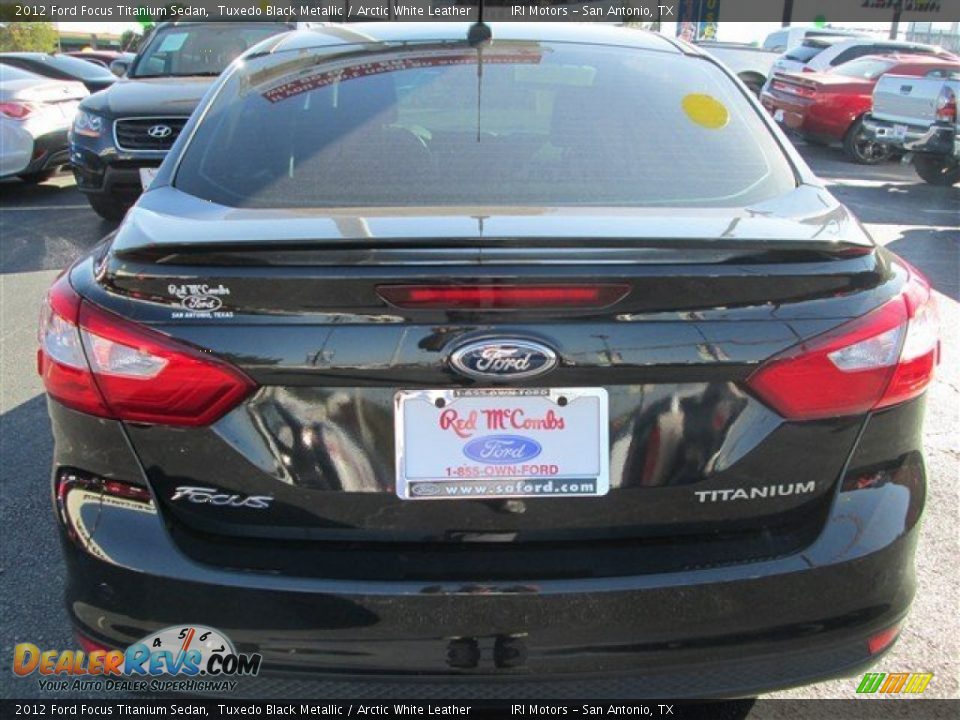 2012 Ford Focus Titanium Sedan Tuxedo Black Metallic / Arctic White Leather Photo #5