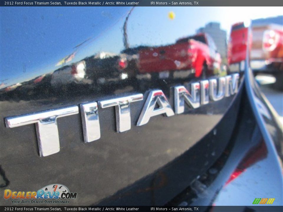 2012 Ford Focus Titanium Sedan Tuxedo Black Metallic / Arctic White Leather Photo #7