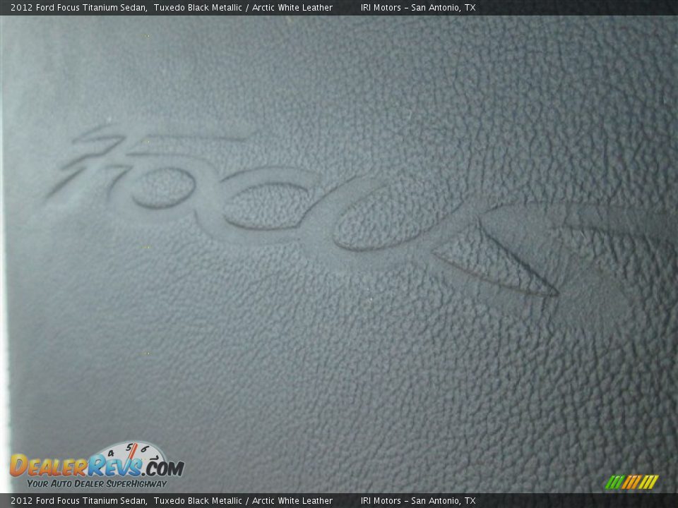 2012 Ford Focus Titanium Sedan Tuxedo Black Metallic / Arctic White Leather Photo #9