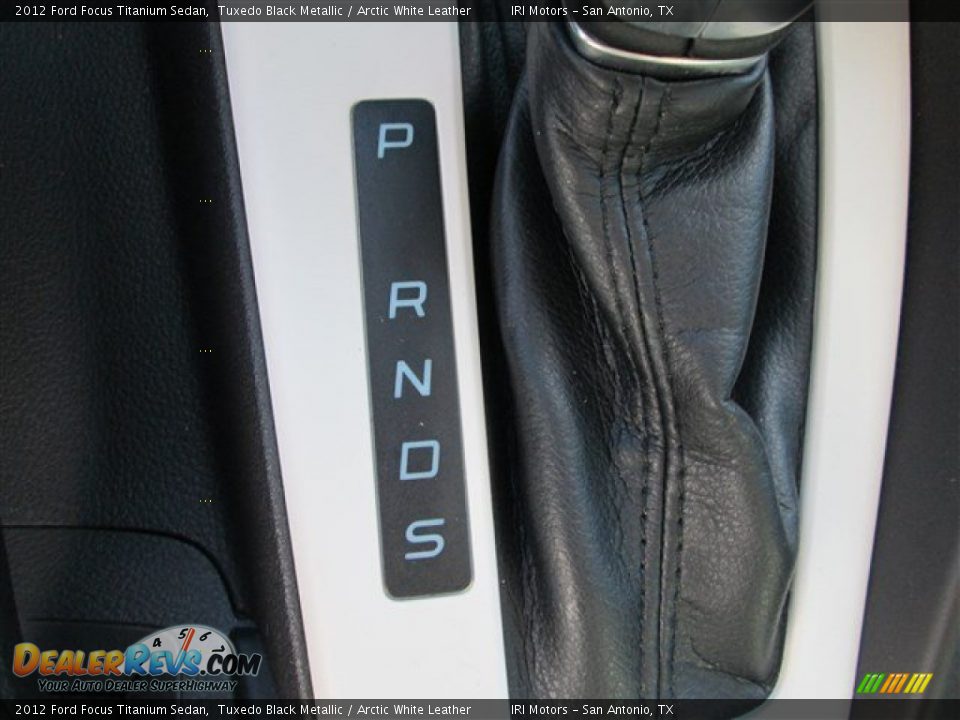 2012 Ford Focus Titanium Sedan Tuxedo Black Metallic / Arctic White Leather Photo #18