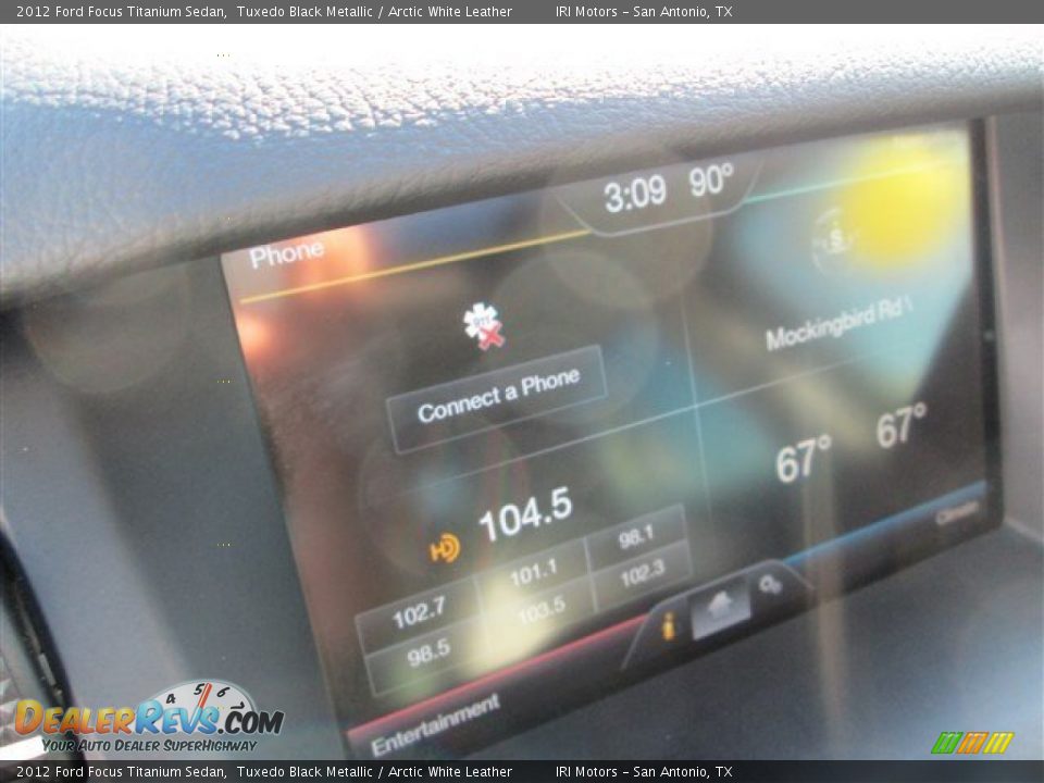 2012 Ford Focus Titanium Sedan Tuxedo Black Metallic / Arctic White Leather Photo #19