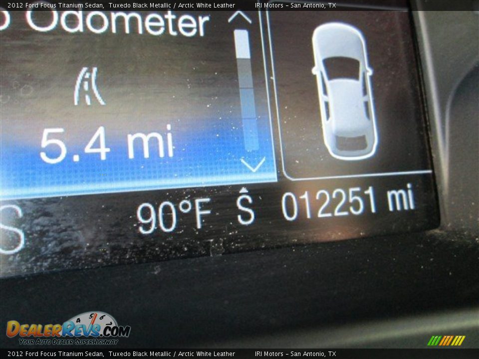 2012 Ford Focus Titanium Sedan Tuxedo Black Metallic / Arctic White Leather Photo #20