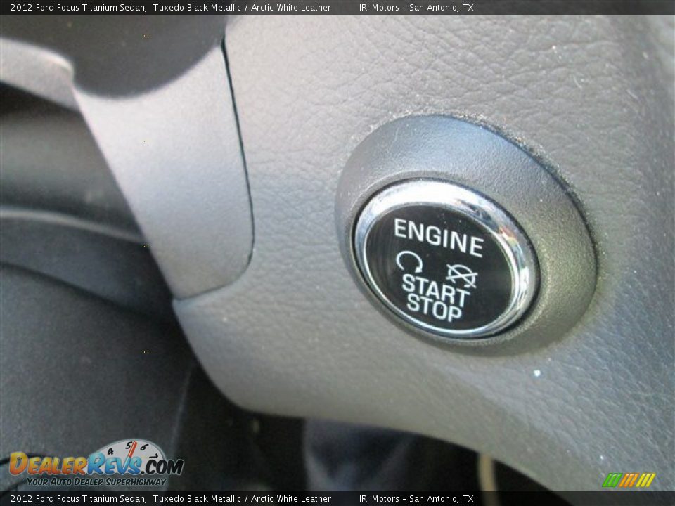 2012 Ford Focus Titanium Sedan Tuxedo Black Metallic / Arctic White Leather Photo #25