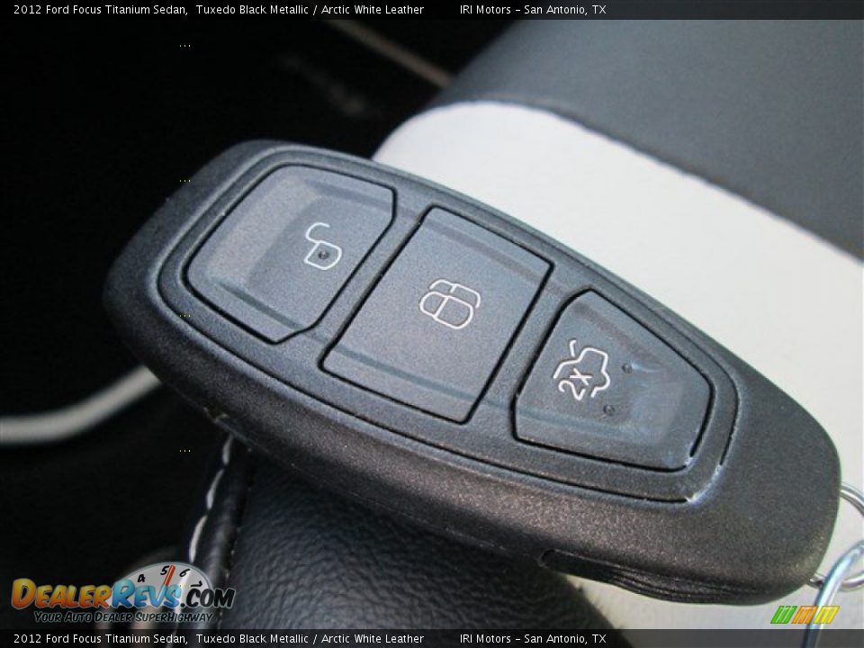 2012 Ford Focus Titanium Sedan Tuxedo Black Metallic / Arctic White Leather Photo #26