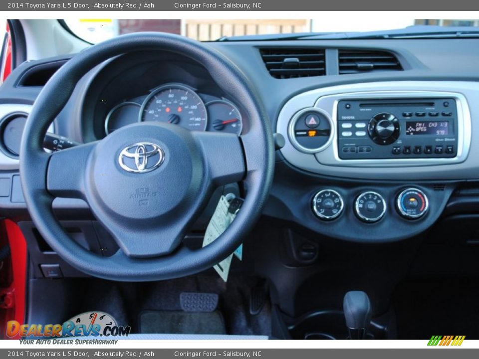Dashboard of 2014 Toyota Yaris L 5 Door Photo #12