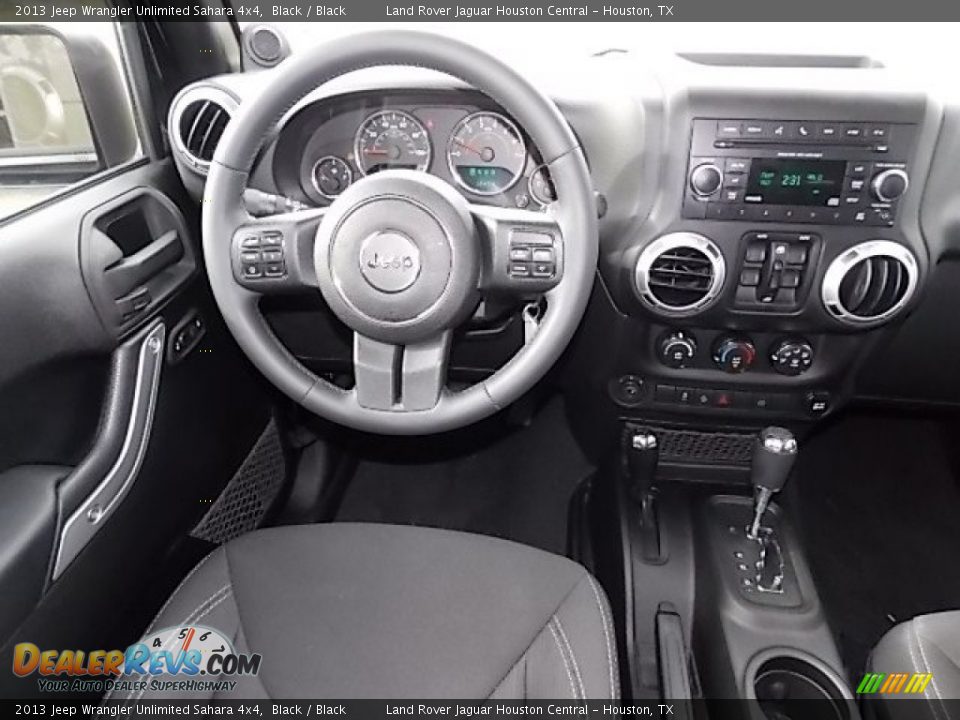 2013 Jeep Wrangler Unlimited Sahara 4x4 Black / Black Photo #12