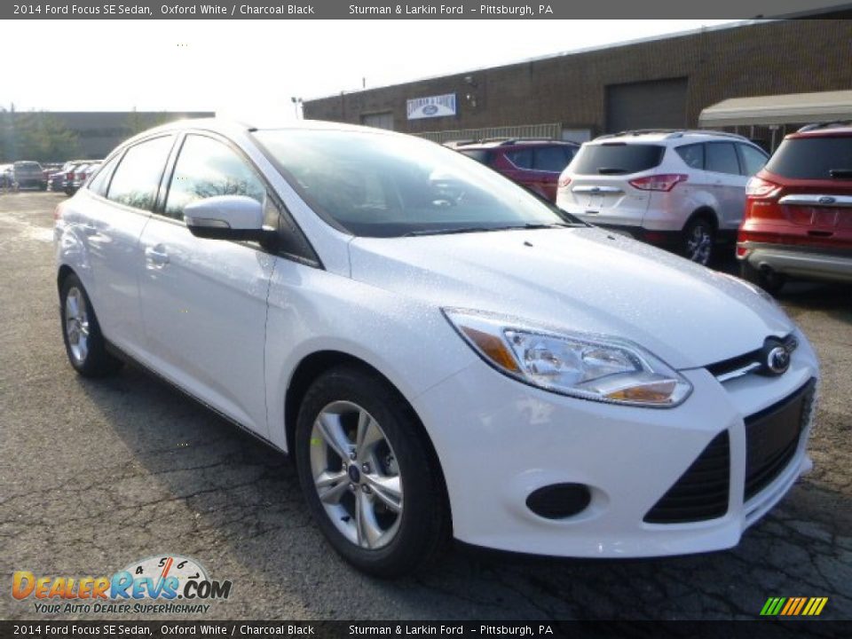 2014 Ford Focus SE Sedan Oxford White / Charcoal Black Photo #1