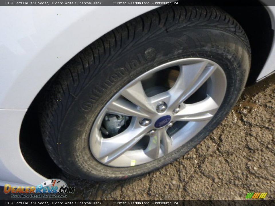 2014 Ford Focus SE Sedan Oxford White / Charcoal Black Photo #7
