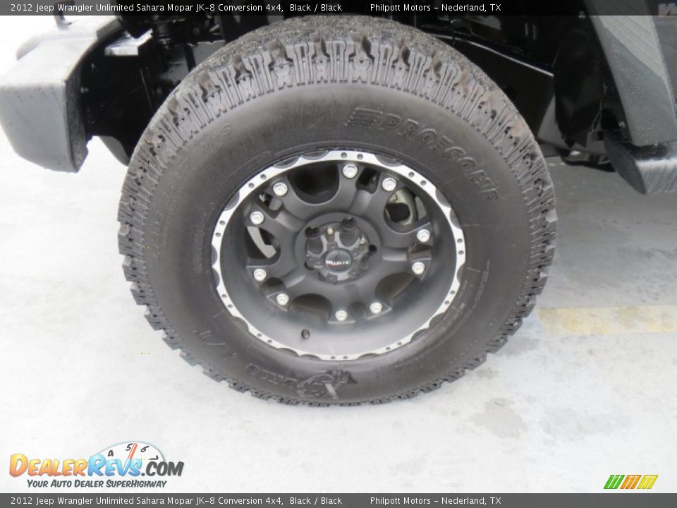 Custom Wheels of 2012 Jeep Wrangler Unlimited Sahara Mopar JK-8 Conversion 4x4 Photo #13