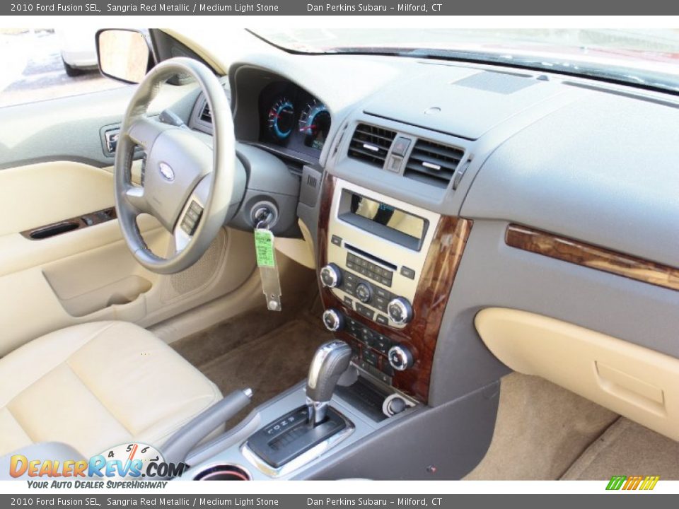 2010 Ford Fusion SEL Sangria Red Metallic / Medium Light Stone Photo #12