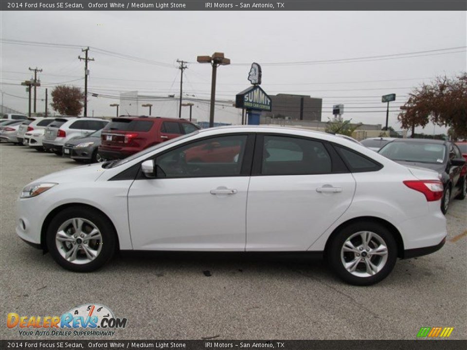 2014 Ford Focus SE Sedan Oxford White / Medium Light Stone Photo #2