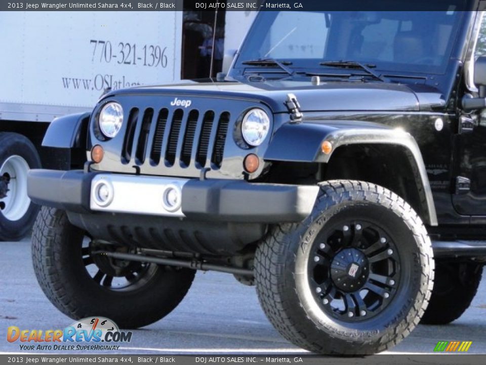 2013 Jeep Wrangler Unlimited Sahara 4x4 Black / Black Photo #26