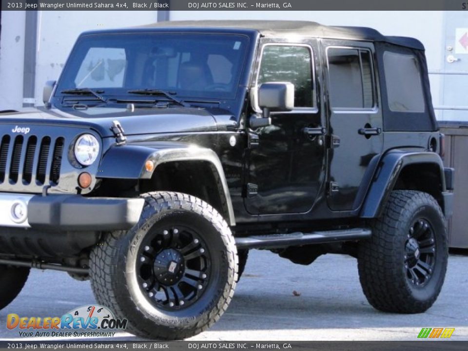 2013 Jeep Wrangler Unlimited Sahara 4x4 Black / Black Photo #28