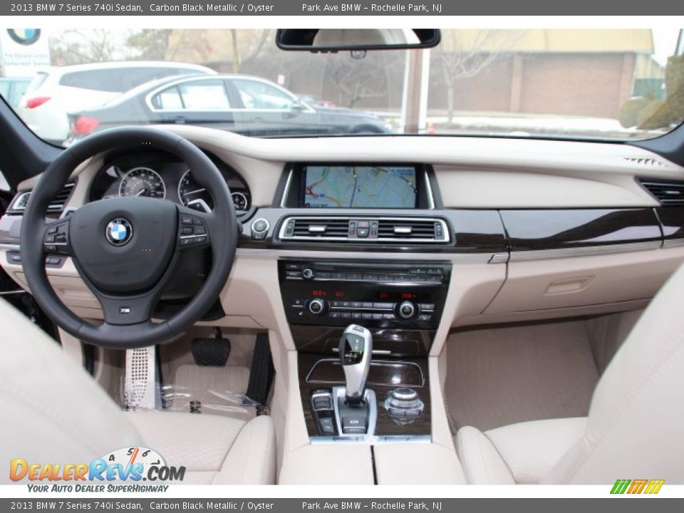 Dashboard of 2013 BMW 7 Series 740i Sedan Photo #12