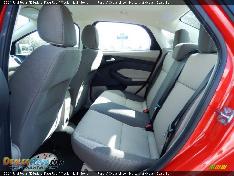 2014 Ford Focus SE Sedan Race Red / Medium Light Stone Photo #7