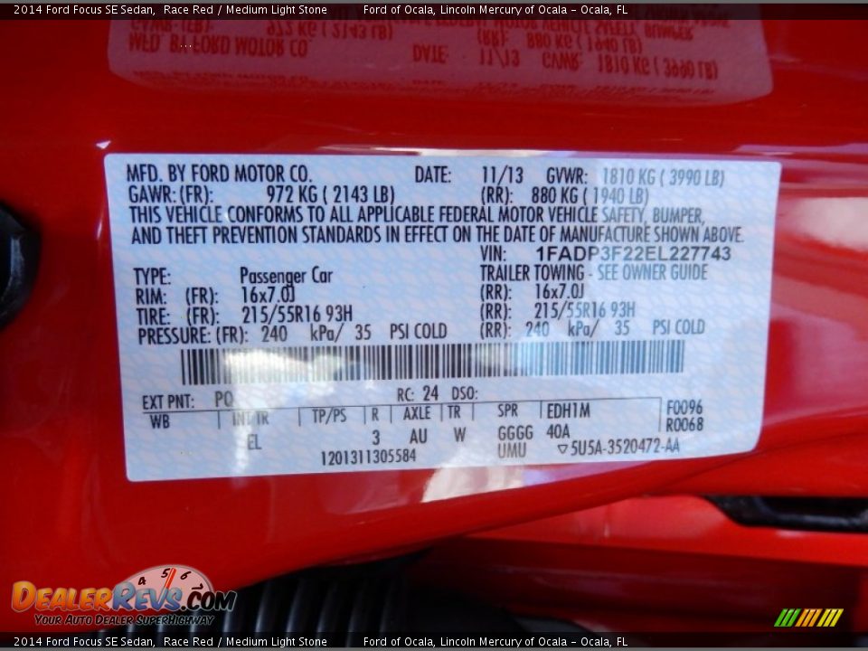 2014 Ford Focus SE Sedan Race Red / Medium Light Stone Photo #12