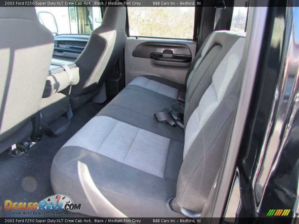 2003 Ford F250 Super Duty XLT Crew Cab 4x4 Black / Medium Flint Grey Photo #27