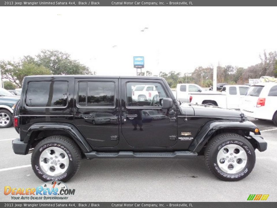 2013 Jeep Wrangler Unlimited Sahara 4x4 Black / Black Photo #10