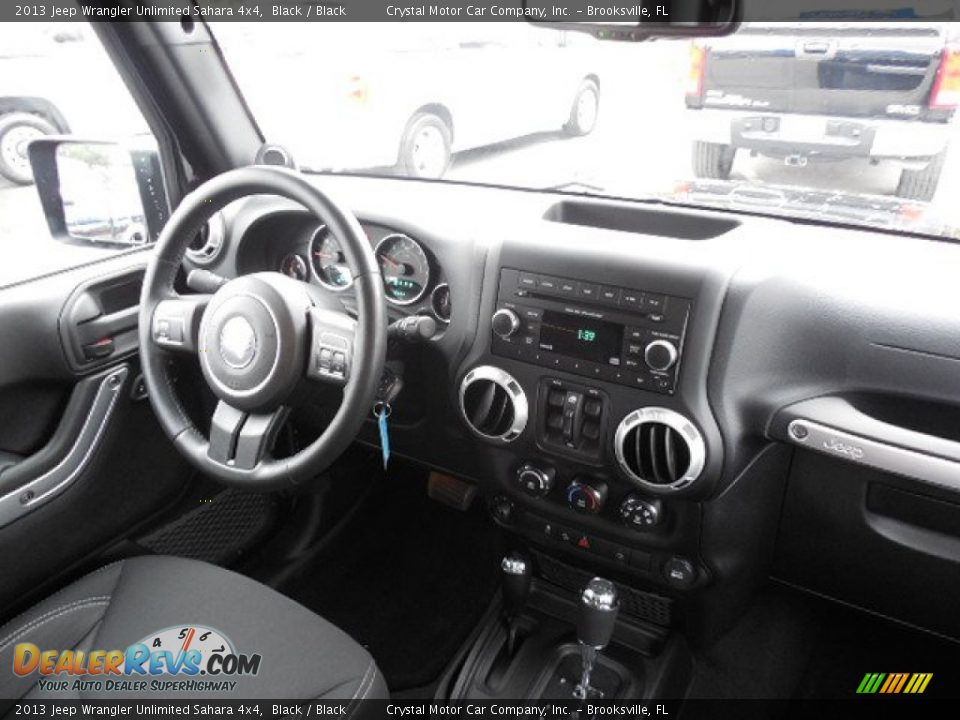 2013 Jeep Wrangler Unlimited Sahara 4x4 Black / Black Photo #12