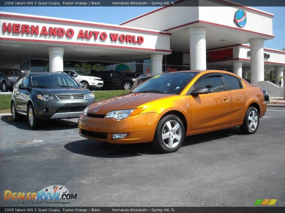 2006 Saturn ION 3 Quad Coupe Fusion Orange / Black Photo #1